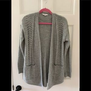 Candie’s gray cardigan sweater
